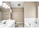 Bathroom featuring a double sink vanity, white tile, tub and shower at 130 Nicki Ct, Hampton, GA 30228