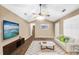 Inviting living room featuring wood floors, vaulted ceilings and ample natural light at 130 Nicki Ct, Hampton, GA 30228
