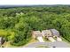 Panoramic aerial view showcasing a neighborhood surrounded by lush green trees, offering serene views and a peaceful environment at 204 Starwood Ct, Acworth, GA 30102