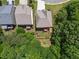 Aerial view of a well-maintained home featuring a private, fenced backyard and mature trees offering serene environment at 204 Starwood Ct, Acworth, GA 30102