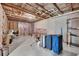 Unfinished basement space with exposed beams, concrete walls, and visible insulation at 204 Starwood Ct, Acworth, GA 30102