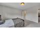 Neutral bedroom with carpet, bed, and doorway to an adjoining room at 204 Starwood Ct, Acworth, GA 30102