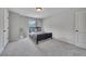 Cozy bedroom with neutral tones, plush carpet, and a bed with decorative pillows at 204 Starwood Ct, Acworth, GA 30102