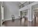 Spacious living room with hardwood floors, high ceilings, and natural light streaming through large windows at 204 Starwood Ct, Acworth, GA 30102