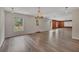 Spacious living room with modern flooring, large windows, and neutral color scheme at 204 Starwood Ct, Acworth, GA 30102