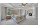 Large main bedroom features trey ceiling, sitting area with fireplace, and decorative carpet at 204 Starwood Ct, Acworth, GA 30102