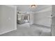 Spacious main bedroom with tray ceiling, carpet floors, and decorative fireplace at 204 Starwood Ct, Acworth, GA 30102