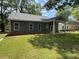 View of the backyard and patio area, ideal for outdoor living and entertaining at 325 Garrison Se Dr, Marietta, GA 30060