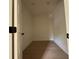 Walk-in closet featuring hardwood floors, storage space, and neutral walls at 325 Garrison Se Dr, Marietta, GA 30060