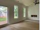 Bright living space showcasing hardwood floors, a shiplap accent wall, and ample natural light at 325 Garrison Se Dr, Marietta, GA 30060