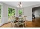 Breakfast nook featuring natural light through large windows overlooking the backyard, and round table with chairs at 4381 Laurian Nw Dr, Kennesaw, GA 30144