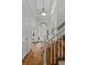 Bright foyer with hardwood floors, staircase, and high ceilings, offering a grand entrance at 4381 Laurian Nw Dr, Kennesaw, GA 30144