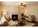 Inviting living room with cozy fireplace and comfortable seating at 7025 Coffield Ct, Cumming, GA 30041