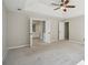 The expansive main bedroom flows into the main bathroom with a luxurious shower and vanity at 7025 Coffield Ct, Cumming, GA 30041