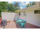 Cozy back deck with outdoor table and chairs is ideal for small gatherings and relaxing outdoors at 905 Scott Sw Ln, Marietta, GA 30008