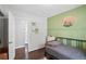 This bedroom features great wall decor, with plenty of natural light at 905 Scott Sw Ln, Marietta, GA 30008