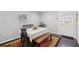 Inviting dining area with a wooden table, bench, and chair seating at 905 Scott Sw Ln, Marietta, GA 30008