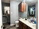 Bathroom featuring a double sink vanity with nice lighting, and a bathtub at 224 Potts Se Rd, Conyers, GA 30094