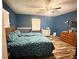 Comfortable bedroom with hardwood floors and ample closet space at 224 Potts Se Rd, Conyers, GA 30094