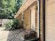 Exterior view of front of house with brick steps, and blooming hydrangea bush at 224 Potts Se Rd, Conyers, GA 30094