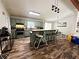 Kitchen with a center island, stainless steel appliances, and wood flooring at 224 Potts Se Rd, Conyers, GA 30094