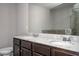 Bathroom with double sinks, granite countertops, and walk-in shower at 2544 Castellan Dr, Atlanta, GA 30316