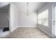 Bright dining area features neutral walls, tiled floor, and natural light at 2544 Castellan Dr, Atlanta, GA 30316