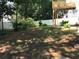 Spacious backyard showing grass and privacy fence; has potential for landscaping or outdoor activities at 318 Summit View Dr, Mcdonough, GA 30253
