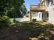 Home exterior showing large backyard, patio and deck above, perfect for outdoor activities and gatherings at 318 Summit View Dr, Mcdonough, GA 30253