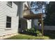 Home exterior highlights a backyard with deck above and patio with room to entertain at 318 Summit View Dr, Mcdonough, GA 30253