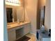 This bathroom includes a double vanity and walk-in shower at 318 Summit View Dr, Mcdonough, GA 30253