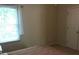 Bedroom with a large window and bed at 318 Summit View Dr, Mcdonough, GA 30253