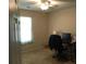 Bedroom with a window, desk, and chair at 318 Summit View Dr, Mcdonough, GA 30253