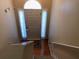 Inviting entryway featuring light walls, tile flooring, and large front door at 318 Summit View Dr, Mcdonough, GA 30253