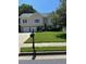 Traditional two-story home with a well-manicured front yard and a two-car garage at 318 Summit View Dr, Mcdonough, GA 30253