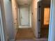 The hallway has doors to the bathroom and other rooms at 318 Summit View Dr, Mcdonough, GA 30253