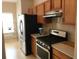 Functional kitchen with stainless steel appliances and ample counter space at 318 Summit View Dr, Mcdonough, GA 30253