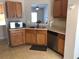 Kitchen featuring wooden cabinets, stainless steel appliances, and functional layout at 318 Summit View Dr, Mcdonough, GA 30253