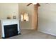 Cozy living room with a fireplace and ample natural light, perfect for relaxation at 318 Summit View Dr, Mcdonough, GA 30253