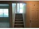 The staircase is carpeted at 318 Summit View Dr, Mcdonough, GA 30253