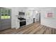 Modern kitchen with stainless steel appliances, white cabinets and subway tile backsplash at 4172 N Martin Way, Lithia Springs, GA 30122