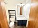 Bathroom with tub/shower, new vanity, and modern fixtures at 60 Parkman Trl, Covington, GA 30016