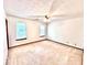Bright bedroom with neutral carpet, two windows, and ceiling fan at 60 Parkman Trl, Covington, GA 30016