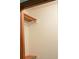 A convenient closet featuring wooden shelving and ample storage space to keep belongings organized at 60 Parkman Trl, Covington, GA 30016