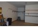 This garage includes additional storage with shelving and an organized utility space at 60 Parkman Trl, Covington, GA 30016
