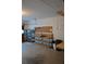 This garage features ample storage space with shelving and a convenient workbench area at 60 Parkman Trl, Covington, GA 30016