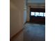 Garage featuring a metal door at 60 Parkman Trl, Covington, GA 30016