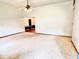 Large living room with a ceiling fan and a view into the next room at 60 Parkman Trl, Covington, GA 30016