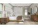 Bedroom with neutral decor, features natural light, side tables, and a decorative mirror at 0 Paige St, Dallas, GA 30157