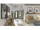 Open-concept living room with hardwood floors, natural light, and stylish decor, creating a welcoming ambiance at 0 Paige St, Dallas, GA 30157